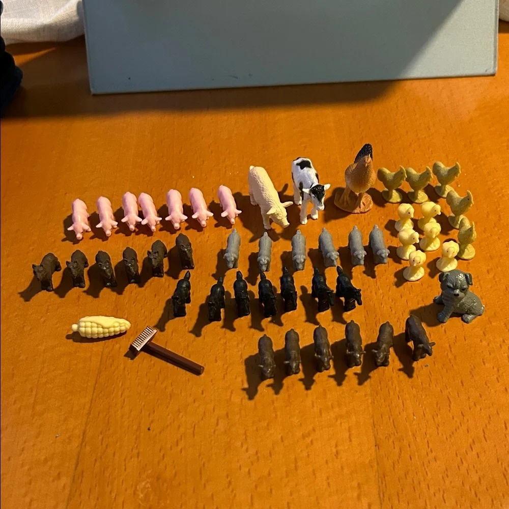 Assorted Used plastic Small Animal Figurine Set in Yellow, Pink, Black, White